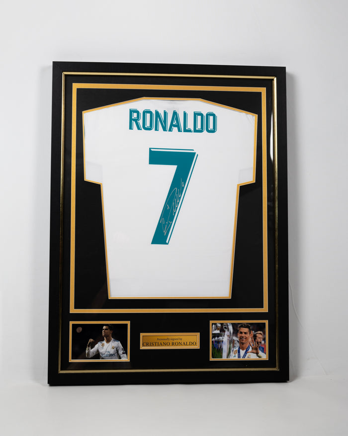 Framed signed Cristiano Ronaldo Real Madrid 2017/18 final season collector's replica jersey in a black and gold display frame